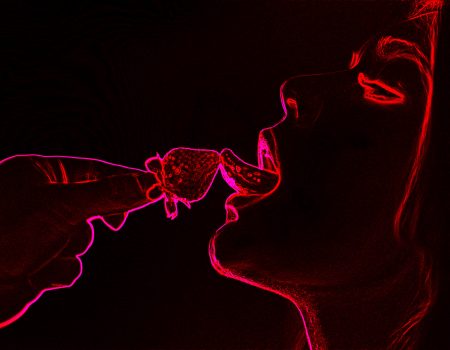 Sexual games silhouette between man and woman with strawberry neon light background